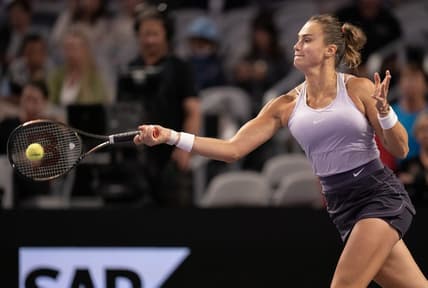 Nov 4, 2022; Forth Worth, TX, USA; Aryna Sabalenka returns a shot during her match against Jessica Pegula (USA) on day five of the WTA Finals at Dickies Arena. Mandatory Credit: Susan Mullane-USA TODAY Sports