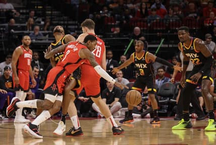 zDec 13, 2022; Houston, Texas, USA;  Houston Rockets guard Kevin Porter Jr. (3) dribbles around Phoenix Suns forward Mikal Bridges (25) using center Alperen Sengun (28) as a pick in the first quarter at Toyota Center. Mandatory Credit: Thomas Shea-USA TODAY Sports