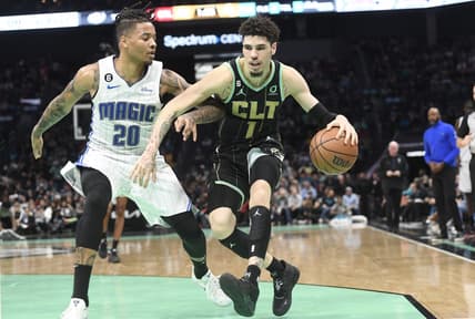 Feb 5, 2023; Charlotte, North Carolina, USA; Charlotte Hornets guard LaMelo Ball (1) drives past Orlando Magic guard Markelle Fultz (20) during the second half at the Spectrum Center. Mandatory Credit: Sam Sharpe-USA TODAY Sports