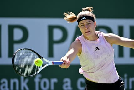 Mar 16, 2023; Indian Wells, CA, USA;  Karolina Muchova (CZE) hits a shot against Elena Rybakina (KAZ) in her quarterfinal match in the BNP Paribas Open at the Indian Wells Tennis Garden. Mandatory Credit: Jayne Kamin-Oncea-USA TODAY Sports