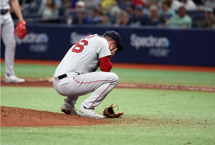 Apr 12, 2023; St. Petersburg, Florida, USA; Boston Red Sox relief pitcher Zack Kelly (76) reacts after a pitch against the Tampa Bay Rays during the fifth inning at Tropicana Field. Mandatory Credit: Kim Klement-USA TODAY Sports