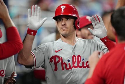 Jul 7, 2023; Miami, Florida, USA; Philadelphia Phillies catcher J.T. Realmuto (10) celebrates in the dugout after hitting a home run in the sixth inning against the Miami Marlins at loanDepot Park. Mandatory Credit: Jim Rassol-USA TODAY Sports