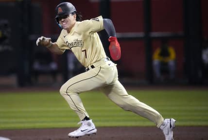 Arizona Diamondbacks Corbin Carroll (7) steals second base against the Pittsburgh Pirates at Chase Field in Phoenix on July 7, 2023.