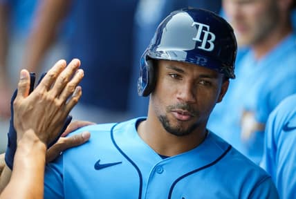 Jul 15, 2023; Kansas City, Missouri, USA; Tampa Bay Rays catcher Francisco Mejia (21) is congratulated by teammates after hitting a home run during the fifth inning against the Kansas City Royals at Kauffman Stadium. Mandatory Credit: Jay Biggerstaff-USA TODAY Sports