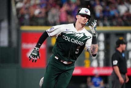 Sep 2, 2023; Denver, Colorado, USA; Colorado Rockies center fielder Brenton Doyle (9) runs the bases after hitting a three run triple against the Toronto Blue Jays in the fifth inning at Coors Field. Mandatory Credit: Ron Chenoy-USA TODAY Sports