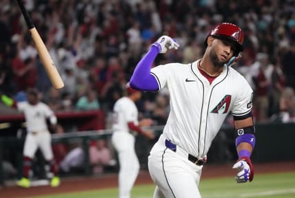 Arizona Diamondbacks Lourdes Gurriel Jr. (12) flips his bat after hitting a 2-run home run against the Colorado Rockies on Opening Day at Chase Field.