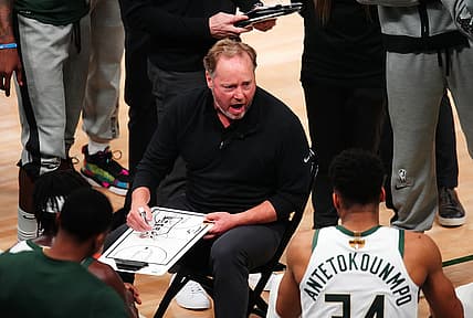 Jul 14, 2021; Milwaukee, Wisconsin, USA; Milwaukee Bucks head coach Mike Budenholzer talks with his team during a time out in the fourth quarter against the Phoenix Suns during game four of the 2021 NBA Finals at Fiserv Forum. Mandatory Credit: Mark J. Rebilas-USA TODAY Sports