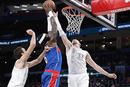 Nov 26, 2021; Oklahoma City, Oklahoma, USA; Oklahoma City Thunder center Mike Muscala (33) blocks a shot by Washington Wizards center Montrezl Harrell (6) during the second quarter at Paycom Center. Mandatory Credit: Alonzo Adams-USA TODAY Sports