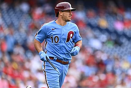 Jul 7, 2022; Philadelphia, Pennsylvania, USA; Philadelphia Phillies catcher JT Realmuto (10) carries a piece of his bat as he advances to first on a single against the Washington Nationals in the fifth inning at Citizens Bank Park. Mandatory Credit: Kyle Ross-USA TODAY Sports