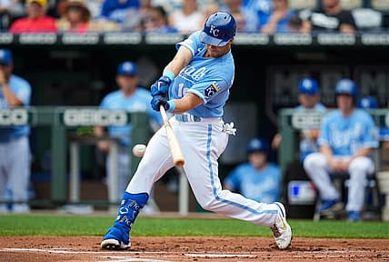 Jul 27, 2022; Kansas City, Missouri, USA; Kansas City Royals designated hitter Andrew Benintendi (16) hits a single against the Los Angeles Angels during the first inning at Kauffman Stadium. Mandatory Credit: Jay Biggerstaff-USA TODAY Sports