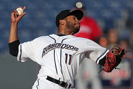 Akron RubberDucks pitcher Xzavion Curry (11) throws against the Erie SeaWolves during the first inning of an MiLB baseball game at Canal Park on Tuesday.

Ducks 1