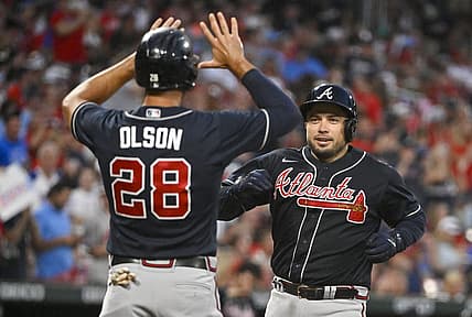 Aug 27, 2022; St. Louis, Missouri, USA;  Atlanta Braves catcher Travis d'Arnaud (16) celebrates with first baseman Matt Olson (28) after hitting a three run home run against the St. Louis Cardinals during the fourth inning at Busch Stadium. Mandatory Credit: Jeff Curry-USA TODAY Sports