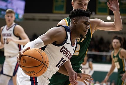 Jan 5, 2023; San Francisco, California, USA; Gonzaga Bulldogs guard Malachi Smith (13) drives the baseline past San Francisco Dons guard Julian Rishwain (2) during the first half at War Memorial at the Sobrato Center. Mandatory Credit: D. Ross Cameron-USA TODAY Sports