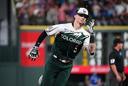 Sep 2, 2023; Denver, Colorado, USA; Colorado Rockies center fielder Brenton Doyle (9) runs the bases after hitting a three run triple against the Toronto Blue Jays in the fifth inning at Coors Field. Mandatory Credit: Ron Chenoy-USA TODAY Sports