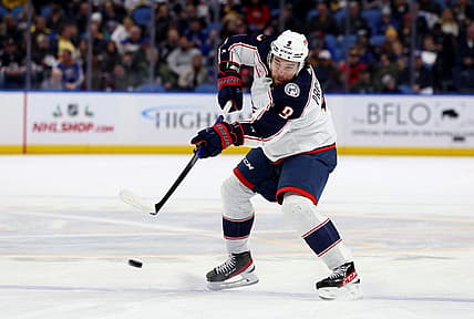 Dec 19, 2023; Buffalo, New York, USA;  Columbus Blue Jackets defenseman Ivan Provorov (9) takes a shot on goal during the first period against the Buffalo Sabres at KeyBank Center. Mandatory Credit: Timothy T. Ludwig-USA TODAY Sports