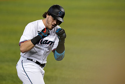 May 4, 2021; Miami, Florida, USA; Miami Marlins third baseman Brian Anderson (15) celebrates his three-run homerun in the 1st inning against the Arizona Diamondbacks at loanDepot park. Mandatory Credit: Jasen Vinlove-USA TODAY Sports