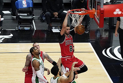May 7, 2021; Chicago, Illinois, USA; Chicago Bulls guard Zach LaVine (8) dunks the ball against the Boston Celtics during the second half at United Center. Mandatory Credit: David Banks-USA TODAY Sports