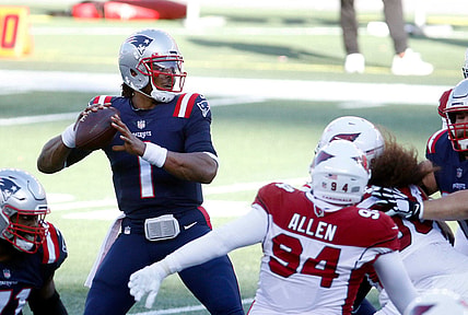 Published Caption:  Patriots quarterback Cam Newton looks for a receiver in the first half against the Arizona Cardinals on Sunday afternoon. [The Providence Journal / Kris Craig] Original Caption:  Patriots quarterback Cam Newton looks for a receiver in the first half against the Arizona Cardinals on Sunday afternoon.

LEDE 2