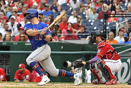 Jun 19, 2021; Washington, District of Columbia, USA; New York Mets first baseman Pete Alonso (20) hits a single against the Washington Nationals during the fourth inning at Nationals Park. Mandatory Credit: Brad Mills-USA TODAY Sports