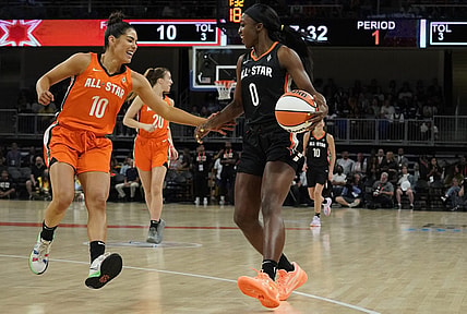 Jul 10, 2022; Chicago, Ill, USA; Team Wilson guard Kelsey Plum (10) defends Team Stewart guard Jackie Young (0) during the first half in a WNBA All Star Game at Wintrust Arena. Mandatory Credit: David Banks-USA TODAY Sports