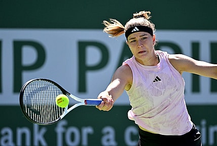 Mar 16, 2023; Indian Wells, CA, USA;  Karolina Muchova (CZE) hits a shot against Elena Rybakina (KAZ) in her quarterfinal match in the BNP Paribas Open at the Indian Wells Tennis Garden. Mandatory Credit: Jayne Kamin-Oncea-USA TODAY Sports