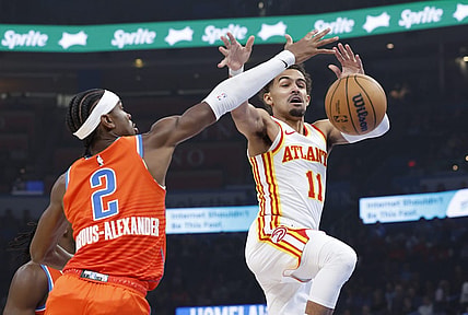 Nov 6, 2023; Oklahoma City, Oklahoma, USA; Oklahoma City Thunder guard Shai Gilgeous-Alexander (2) defends Atlanta Hawks guard Trae Young (11) as he looses control of the ball during the first quarter at Paycom Center. Mandatory Credit: Alonzo Adams-USA TODAY Sports