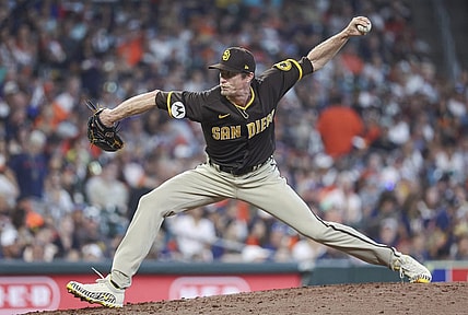 Sep 10, 2023; Houston, Texas, USA; San Diego Padres relief pitcher Tim Hill (25) delivers a pitch during the sixth inning against the Houston Astros at Minute Maid Park. Mandatory Credit: Troy Taormina-USA TODAY Sports