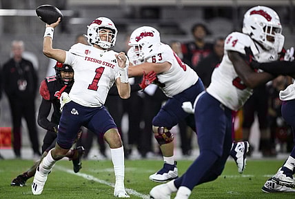 Nov 25, 2023; San Diego, California, USA; Fresno State Bulldogs quarterback Mikey Keene (1) throws a pass against the San Diego State Aztecs during the first half at Snapdragon Stadium. Mandatory Credit: Orlando Ramirez-USA TODAY Sports