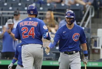 May 25, 2021; Pittsburgh, Pennsylvania, USA; Chicago Cubs right fielder Kris Bryant (right) congratulates left fielder Joc Pederson (24) on his solo home run against the Pittsburgh Pirates during the third inning at PNC Park. Mandatory Credit: Charles LeClaire-USA TODAY Sports