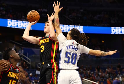 Feb 16, 2022; Orlando, Florida, USA; Atlanta Hawks guard Kevin Huerter (3) shoots over Orlando Magic guard Cole Anthony (50) during the first quarter at Amway Center. Mandatory Credit: Kim Klement-USA TODAY Sports