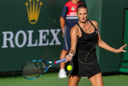 Karolina Pliskova of Czechia returns the ball to Beatriz Haddad Maia of Brazil during their round three match of the BNP Paribas Open, Monday, Oct. 11, 2021, in Indian Wells, Calif.