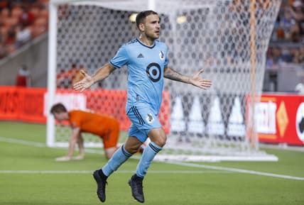 Jul 23, 2022; Houston, Texas, USA; Minnesota United FC midfielder Franco Fragapane (7) celebrates after scoring a goal during the first half against the Houston Dynamo FC at PNC Stadium. Mandatory Credit: Troy Taormina-USA TODAY Sports