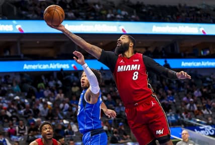 Nov 2, 2021; Dallas, Texas, USA;  Miami Heat forward Markieff Morris (8) grabs a rebound over Dallas Mavericks guard Jalen Brunson (13) during the second quarter at American Airlines Center. Mandatory Credit: Kevin Jairaj-USA TODAY Sports