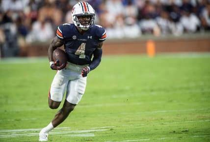 Auburn Tigers running back Tank Bigsby (4) runs the ball as Auburn Tigers take on Mercer Bears at Jordan-Hare Stadium in Auburn, Ala., on Saturday, Sept. 3, 2022. Auburn Tigers leads Mercer Bears 28-7 at halftime.