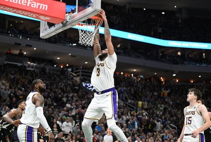 Dec 2, 2022; Milwaukee, Wisconsin, USA;  Los Angeles Lakers forward Anthony Davis (3) dunks the ball in the  closing minutes in the second half against the Milwaukee Bucksat Fiserv Forum. Mandatory Credit: Michael McLoone-USA TODAY Sports