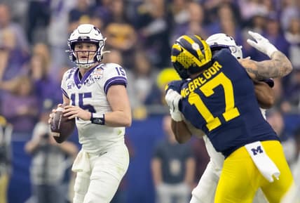 Dec 31, 2022; Glendale, Arizona, USA; TCU Horned Frogs quarterback Max Duggan (15) against the Michigan Wolverines during the 2022 Fiesta Bowl at State Farm Stadium. Mandatory Credit: Mark J. Rebilas-USA TODAY Sports