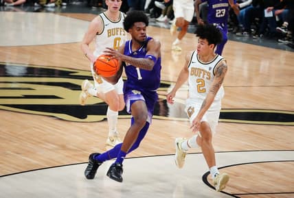 Jan 19, 2023; Boulder, Colorado, USA; Washington Huskies forward Keion Brooks (1) drives at Colorado Buffaloes guard KJ Simpson (2) in the first half at the CU Events Center. Mandatory Credit: Ron Chenoy-USA TODAY Sports