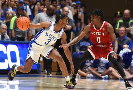 Feb 28, 2023; Durham, North Carolina, USA; Duke Blue Devils guard Jeremy Roach (3) controls the ball in front of North Carolina State Wolfpack guard Terquavion Smith (0) during the first half at Cameron Indoor Stadium. Mandatory Credit: Rob Kinnan-USA TODAY Sports