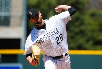 Apr 30, 2023; Denver, Colorado, USA; Colorado Rockies starting pitcher Austin Gomber (26) delivers a pitch in the first inning against the Arizona Diamondbacks at Coors Field. Mandatory Credit: Ron Chenoy-USA TODAY Sports