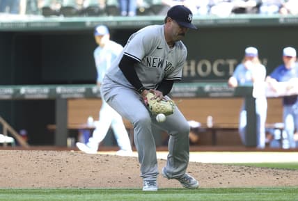 Apr 30, 2023; Arlington, Texas, USA;  New York Yankees relief pitcher Nick Ramirez (63) bobbles the ball during the eighth inning against the Texas Rangers at Globe Life Field. Mandatory Credit: Kevin Jairaj-USA TODAY Sports