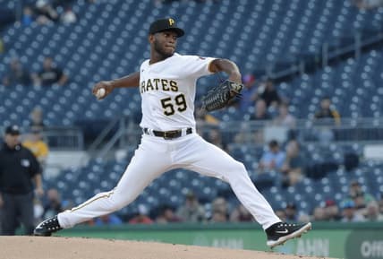 Apr 20, 2023; Pittsburgh, Pennsylvania, USA;  Pittsburgh Pirates starting pitcher Roansy Contreras (59) delivers a pitch against the Cincinnati Reds during the first inning at PNC Park. Mandatory Credit: Charles LeClaire-USA TODAY Sports