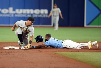 May 2, 2023; St. Petersburg, Florida, USA; Tampa Bay Rays center fielder Manuel Margot (13) slides safe into second base as Pittsburgh Pirates second baseman Mark Mathias (6) attempts to tag him out during the third inning at Tropicana Field. Mandatory Credit: Kim Klement-USA TODAY Sports