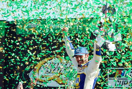 Jul 10, 2022; Hampton, Georgia, USA; NASCAR Cup Series driver Chase Elliott (9) celebrates in Victory Lane winning the Quaker State 400 at Atlanta Motor Speedway. Mandatory Credit: John David Mercer-USA TODAY Sports