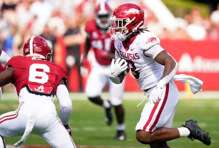 Oct 14, 2023; Tuscaloosa, Alabama, USA; Arkansas Razorbacks tight end Ty Washington (8) runs the ball up the field against the Alabama Crimson Tide during the first quarter at Bryant-Denny Stadium. Mandatory Credit: John David Mercer-USA TODAY Sports