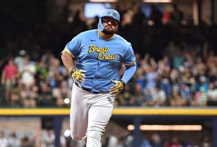 Aug 25, 2023; Milwaukee, Wisconsin, USA; Milwaukee Brewers first baseman Rowdy Tellez (11) rounds the bases after hitting a home run agains the San Diego Padres in the third inning at American Family Field. Mandatory Credit: Michael McLoone-USA TODAY Sports