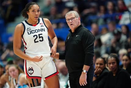 Nov 8, 2023; Hartford, Connecticut, USA; UConn Huskies head coach Geno Auriemma talks with forward Ice Brady (25) from the sideline as they take on the Dayton Flyers at XL Center. Mandatory Credit: David Butler II-USA TODAY Sports