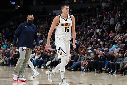 Dec 13, 2021; Denver, Colorado, USA; Denver Nuggets center Nikola Jokic (15) reacts after being ejected in the second half against the Washington Wizards at Ball Arena. Mandatory Credit: Ron Chenoy-USA TODAY Sports