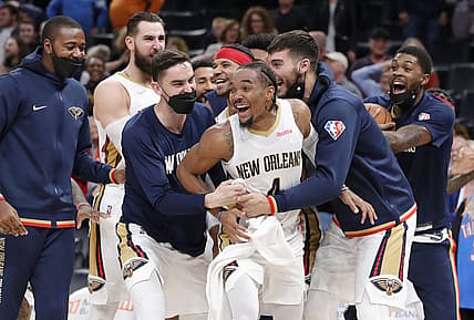Dec 15, 2021; Oklahoma City, Oklahoma, USA; New Orleans Pelicans guard Devonte' Graham (4) celebrates with his team after hitting the game winning three point shot as time expired against the Oklahoma City Thunder during the second half at Paycom Center. New Orleans won 113-110. Mandatory Credit: Alonzo Adams-USA TODAY Sports