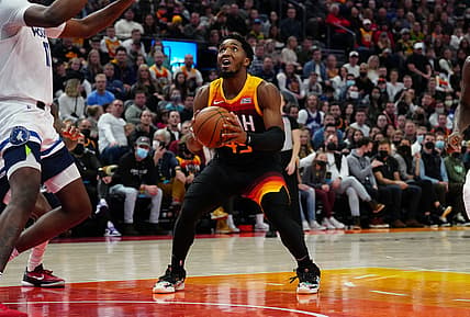 Dec 31, 2021; Salt Lake City, Utah, USA; Utah Jazz guard Donovan Mitchell (45) prepares to shoot the ball in the second half against the Minnesota Timberwolves at Vivint Arena. Mandatory Credit: Ron Chenoy-USA TODAY Sports