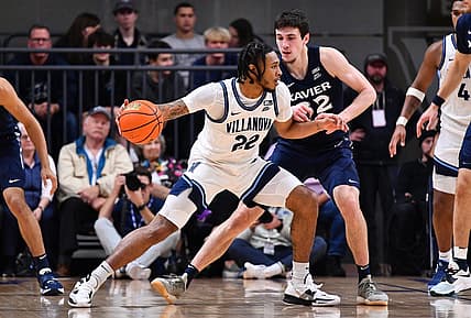Jan 7, 2023; Villanova, Pennsylvania, USA; Villanova Wildcats forward Cam Whitmore (22) controls the ball against Xavier Musketeers forward Zach Freemantle (32) in the second half at William B. Finneran Pavilion. Mandatory Credit: Kyle Ross-USA TODAY Sports
